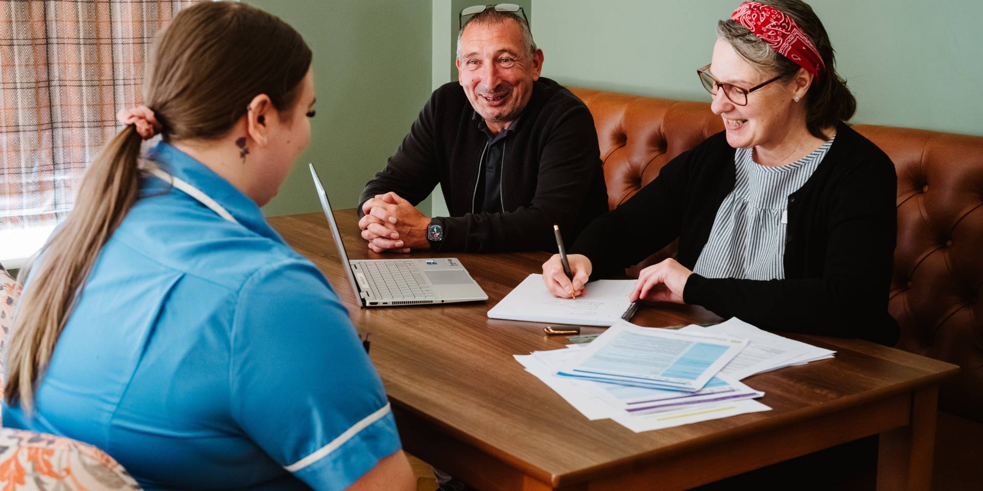 A group of social care leaders in a meeting
