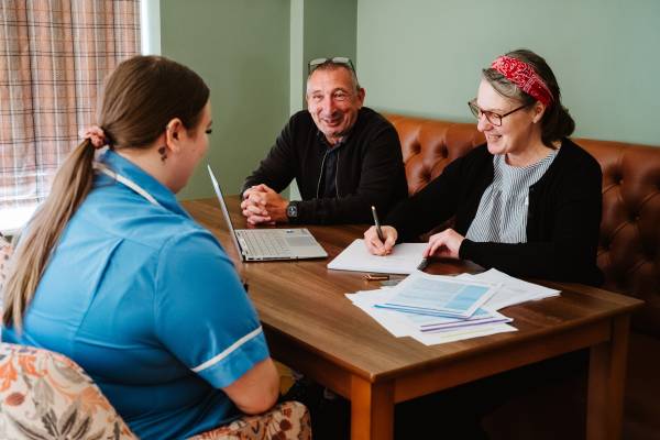 A group of social care leaders in a meeting